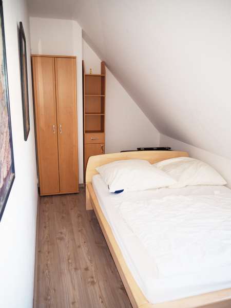 kleines Schlafzimmer OG - Bildergalerie: Ferienwohnung Zingst Ostsee